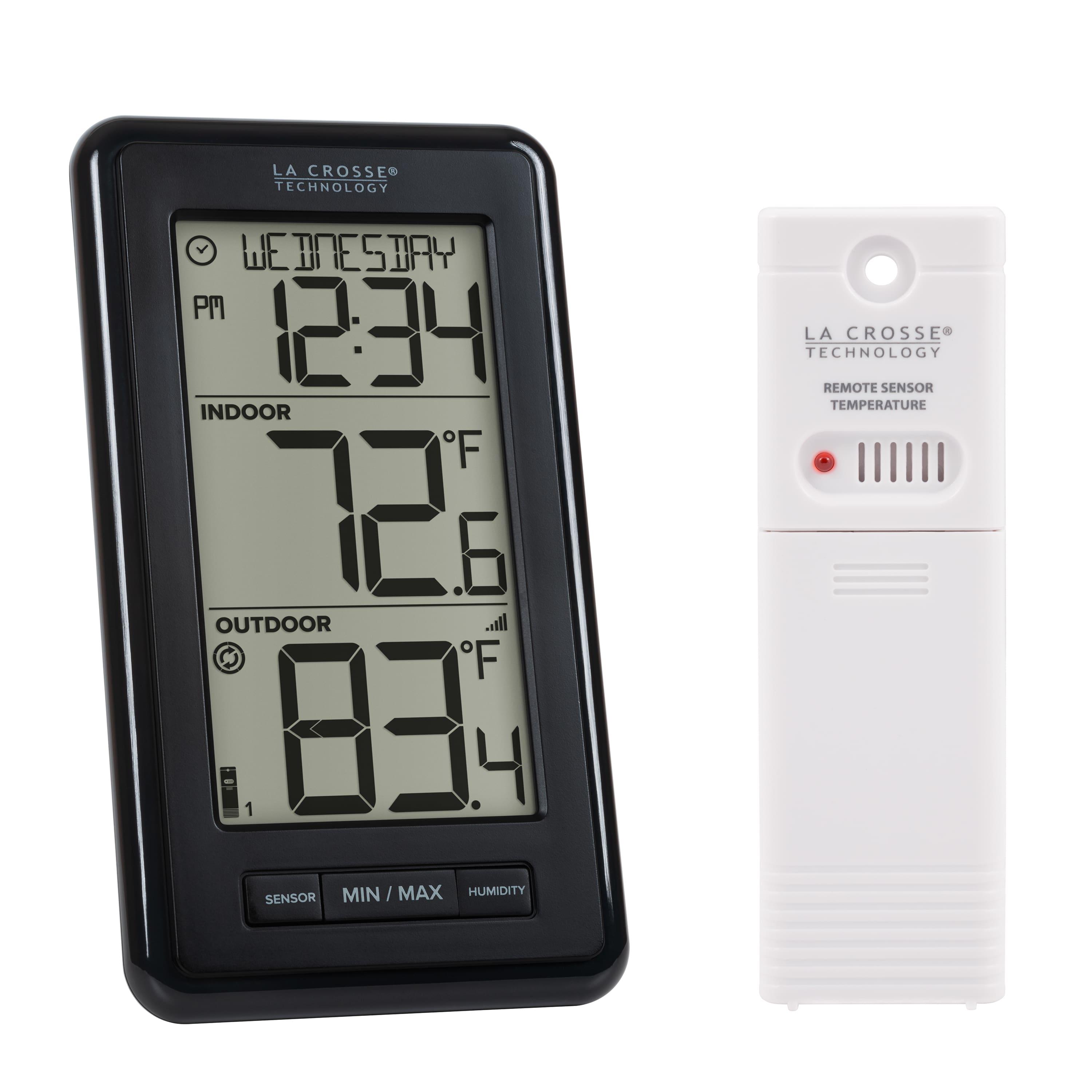 La Crosse Weather Station displaying indoor and outdoor temperatures on a table