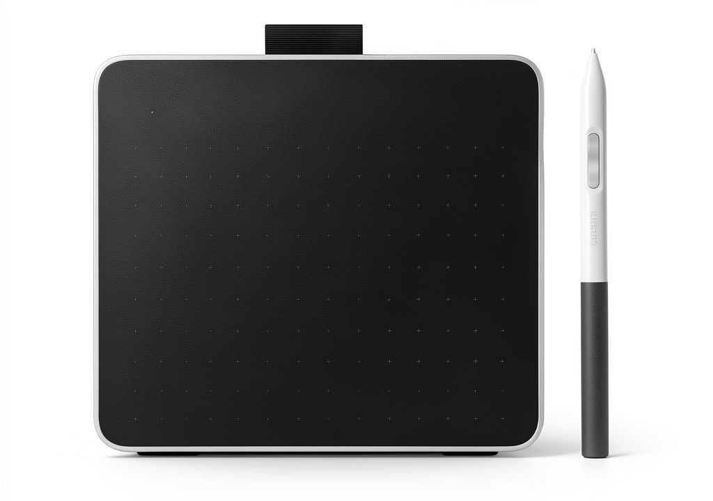 Wacom One Small drawing tablet on a desk with pen and cable